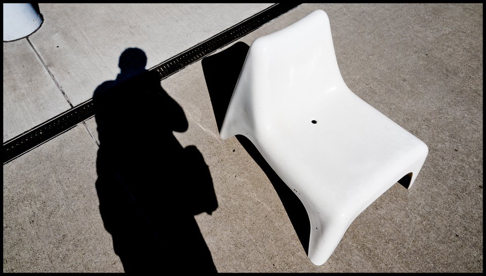 White Chair on Concrete - ID 012470